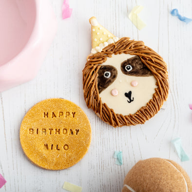 Personalised Sebastian the Sloth Celebration Iced Dog Biscuit Duo