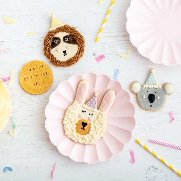 Personalised Larry the Llama Celebration Iced Dog Biscuit Duo