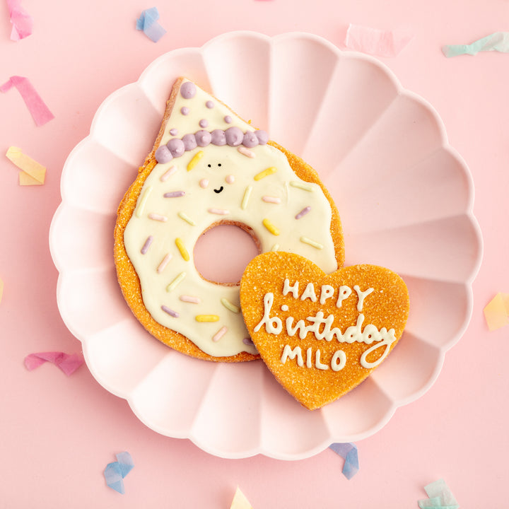 Personalised Giant Doughnut Celebration Iced Dog Biscuit Duo